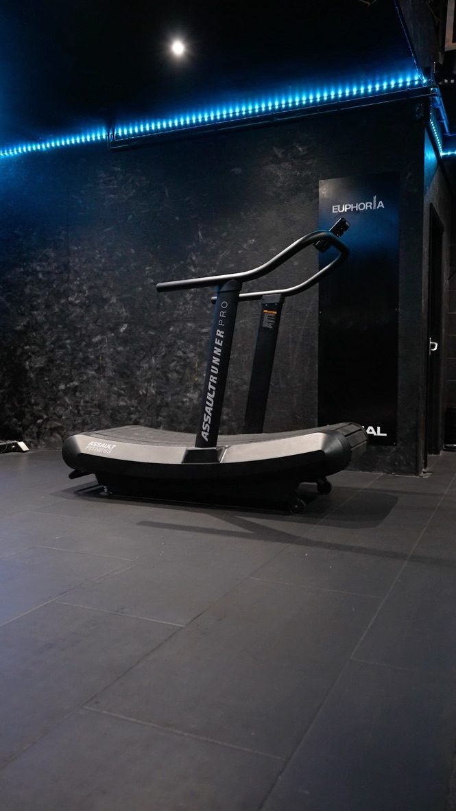 Curved treadmill under the blue LED strip